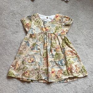 Hand Sewn Winnie the Pooh Dress with buttons on back.